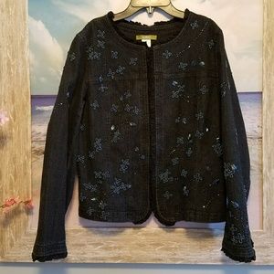 Black beaded denim jacket by Acorn.